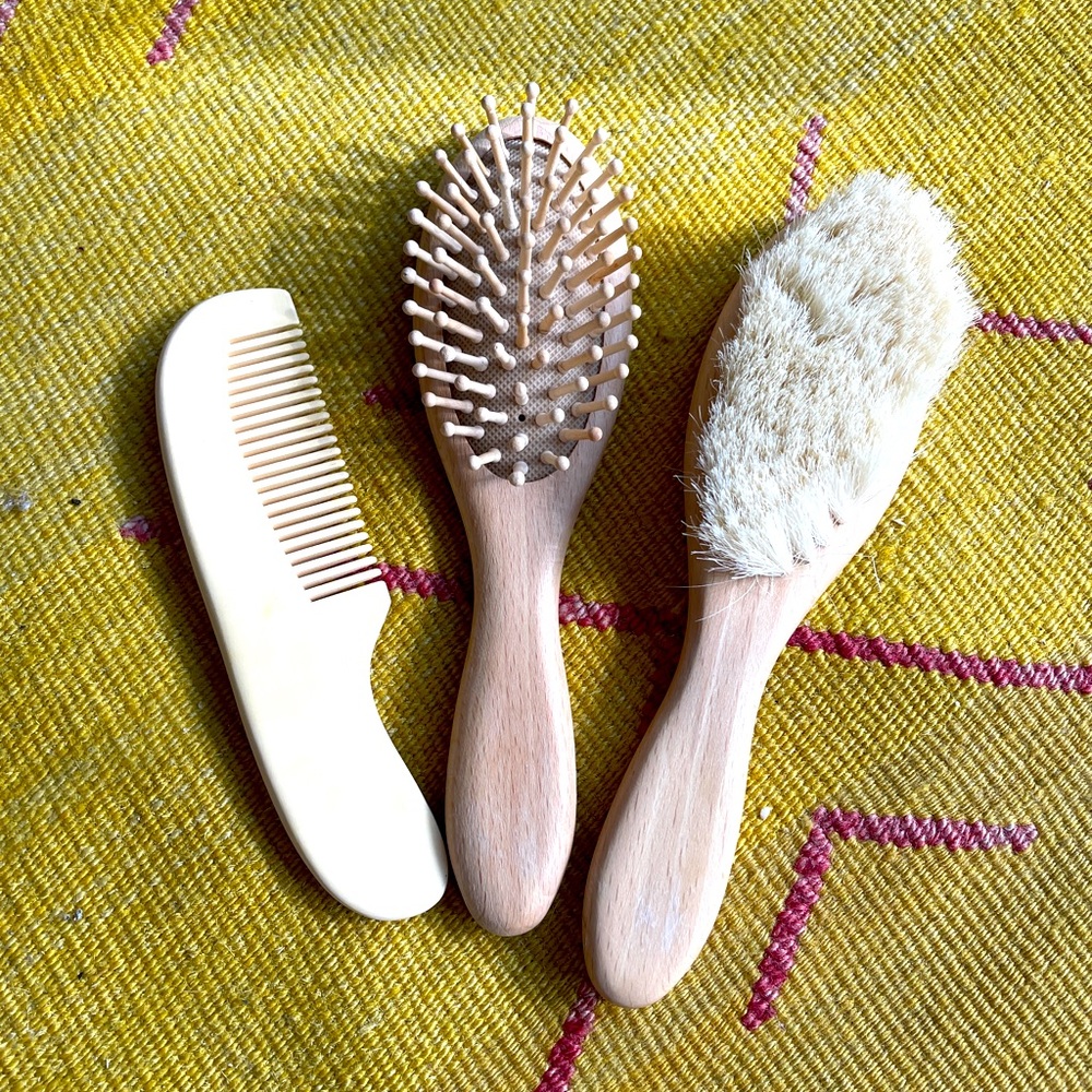 Gently used baby brushes and comb all natural wood